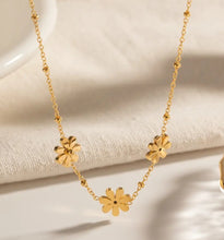 Load image into Gallery viewer, Three Flower Charm Gold Necklace
